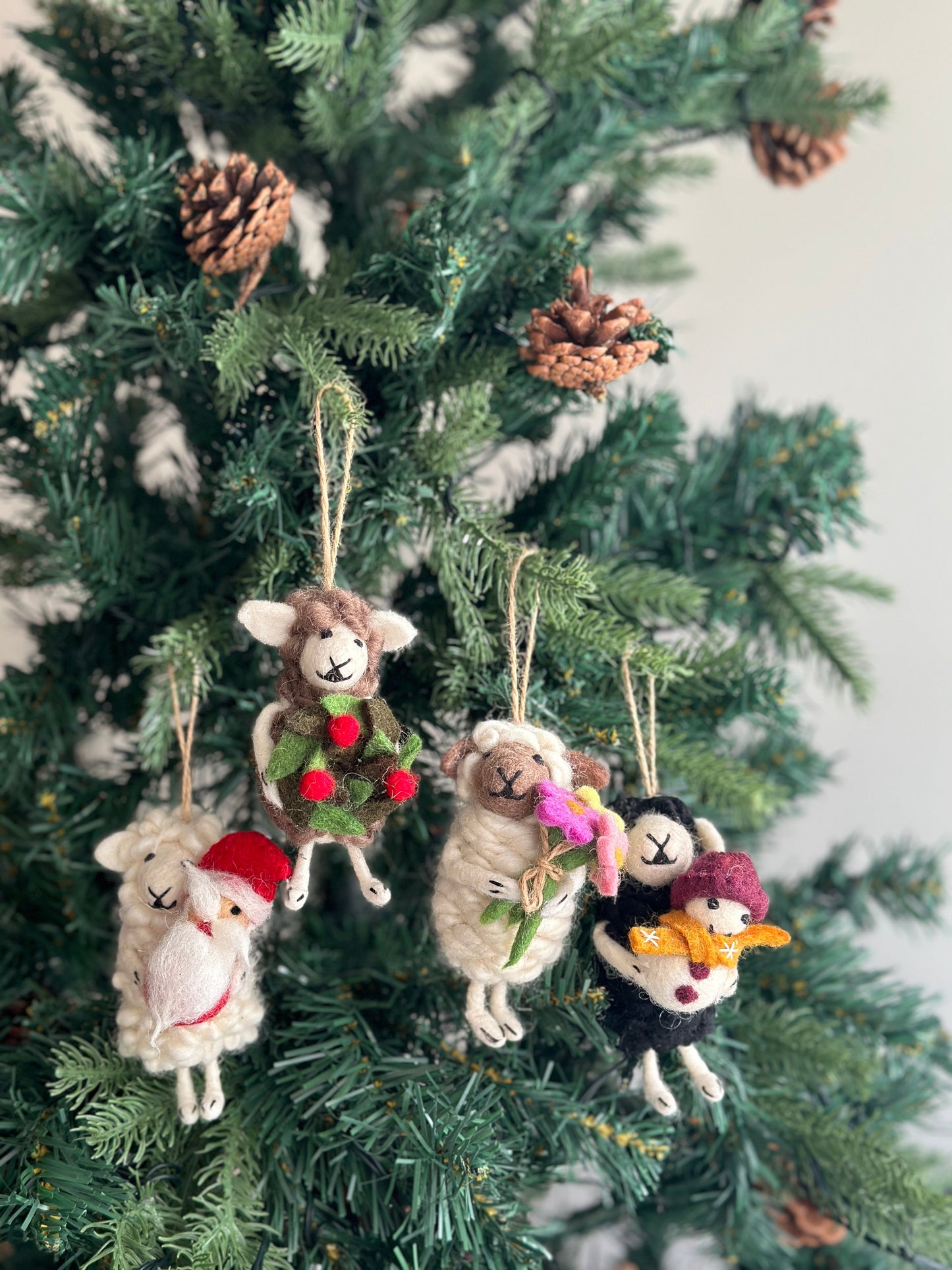 Black Sheep Holding Snowman Ornament