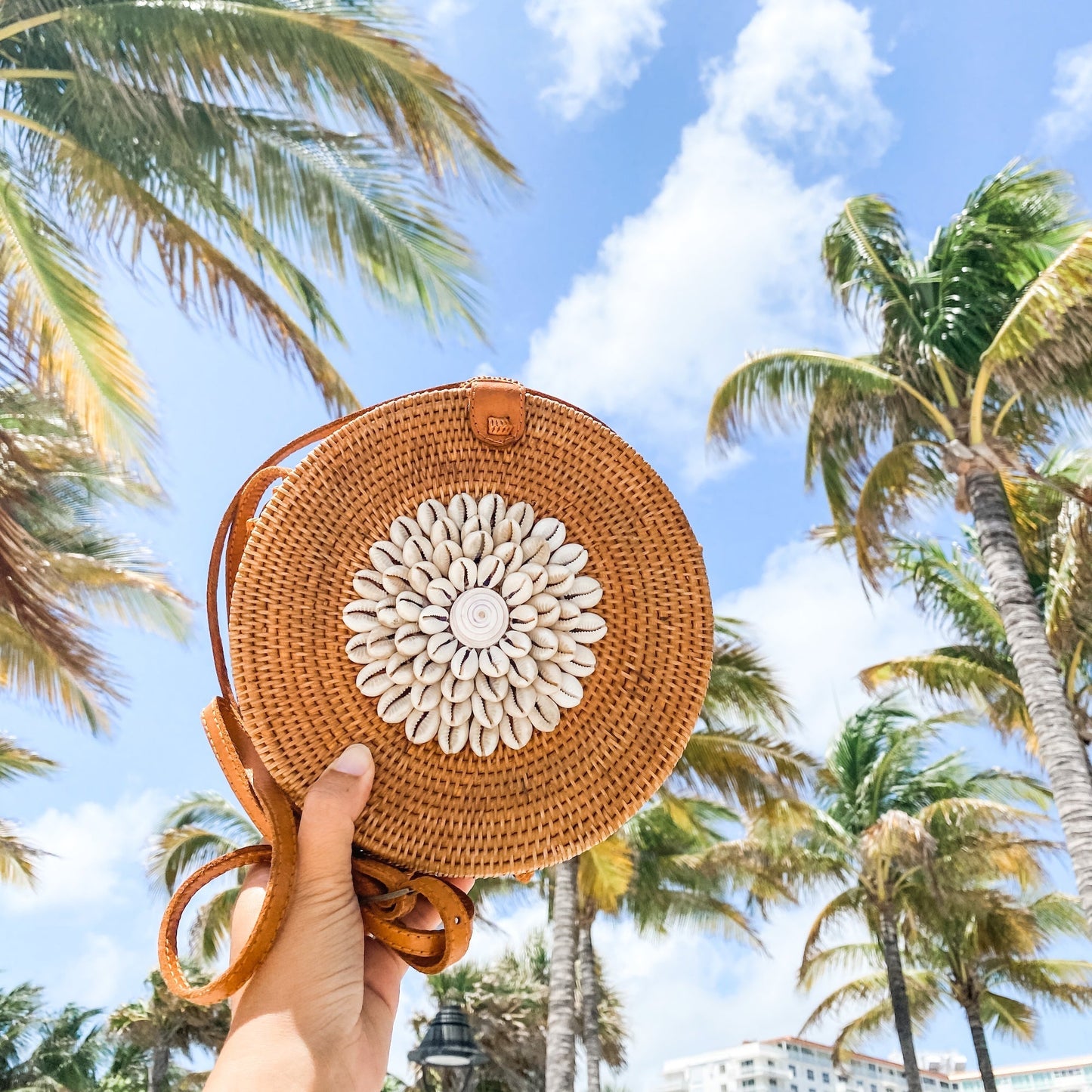 Bali Round Rattan Bag with Seashell Embellishment. Handmade in Bali by Ganapati Crafts Co.