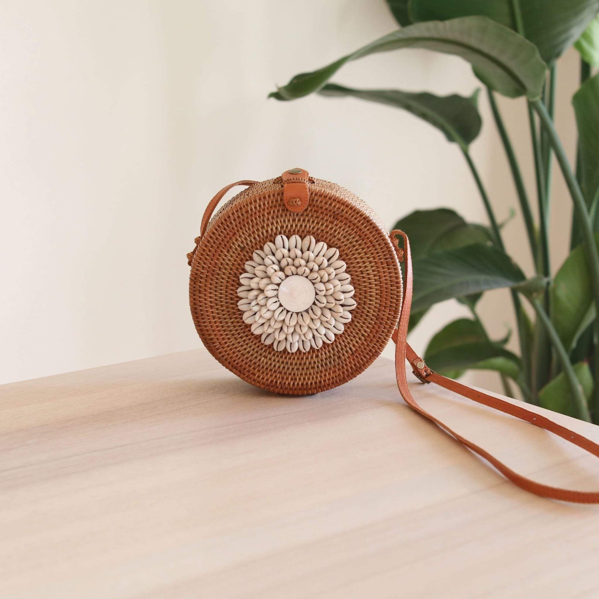 Bali Round Rattan Bag with Seashell Embellishment. Handmade in Bali by Ganapati Crafts Co.