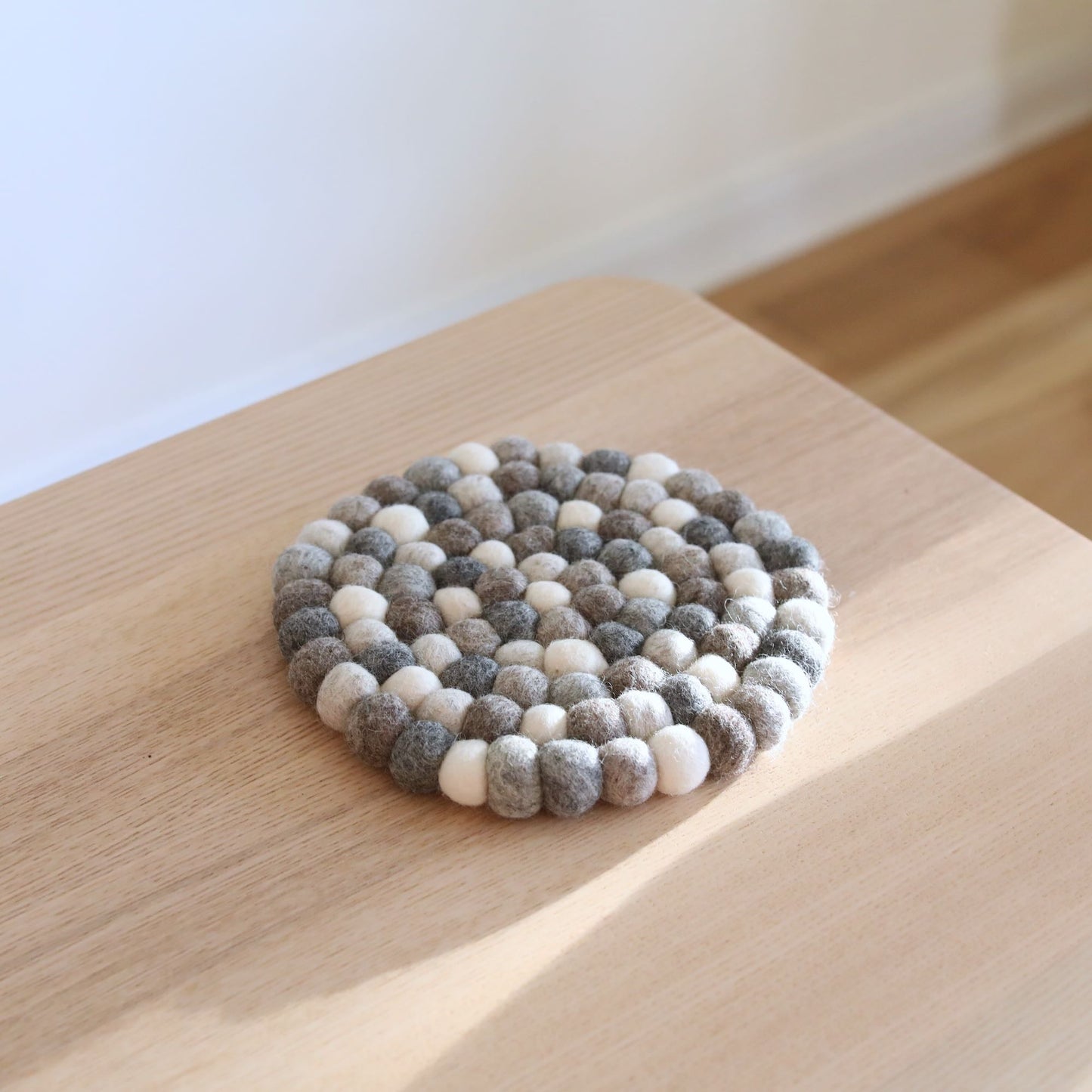 Wool felt gray circle trivet - Ganapati Crafts Co.