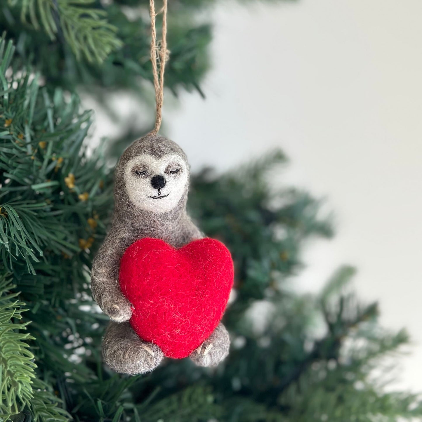 Sloth's Love Embrace - Holiday Heart Ornament